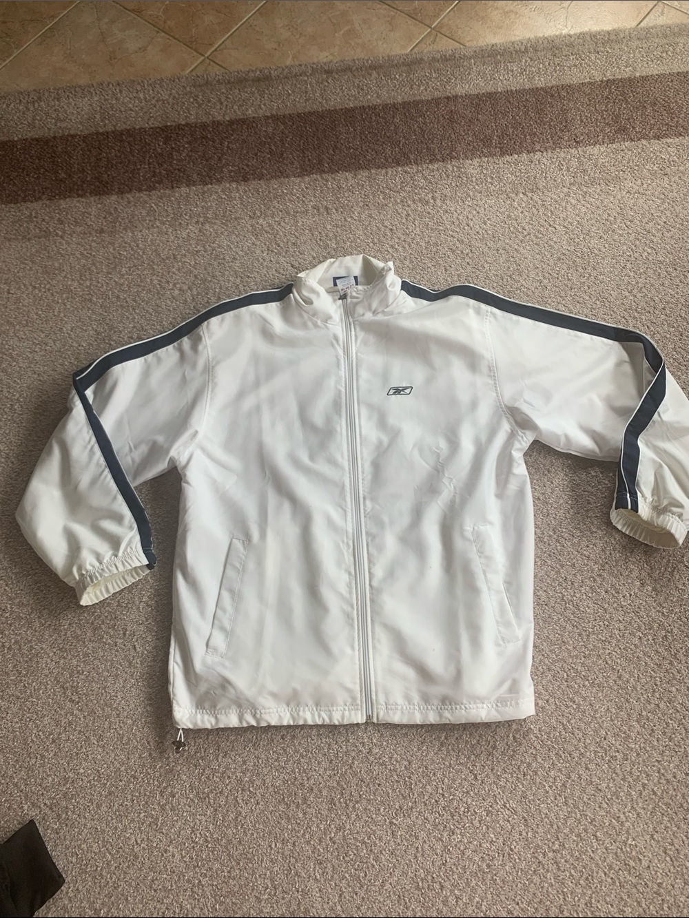 Reebok White Performance Jacket with Navy Stripe